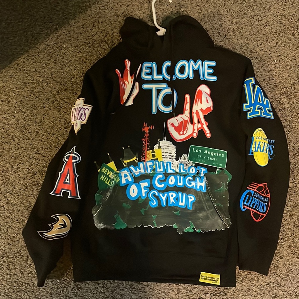 I am selling my rolling loud Desto Dubb awful lot of cough syrup hoodie size S